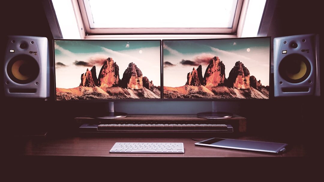 Modern video editing studio with multiple monitors